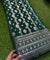 Premium Quality Of Dola Silk With Fine Zari Weaving & Sequin Zari Embroidery ( Dark Green )
